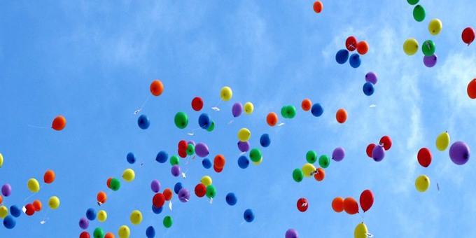 Balloons mark family killings