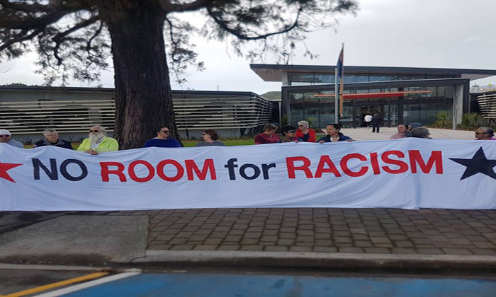 Racism reaction in breach of council conduct
