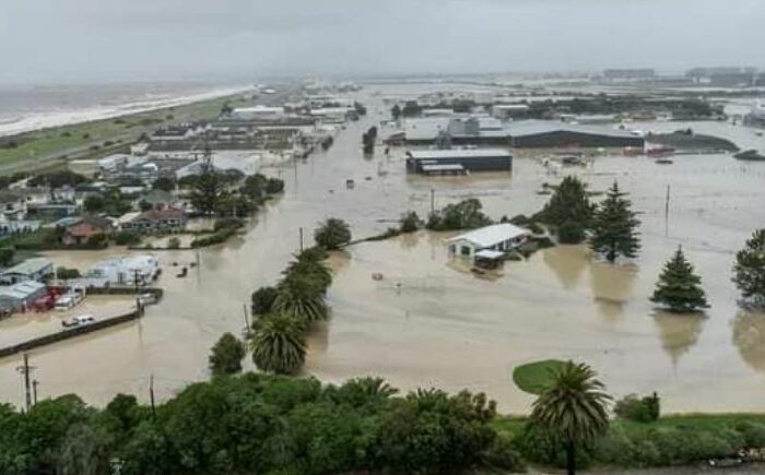 Uncles on roofs as Hawke's Bay river bursts banks